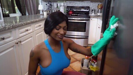 Ebony cleans around the house and fucks