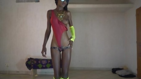 Stunning Slim Ebony Beauty In a Sexy Outfit Shows Off Her Seductive Graceful Body