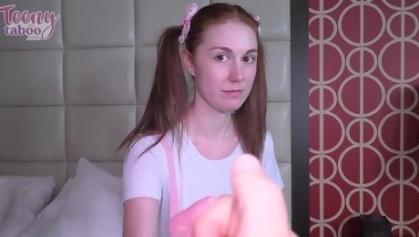 Innocent redhead cutie sucks and spreads her long legs.